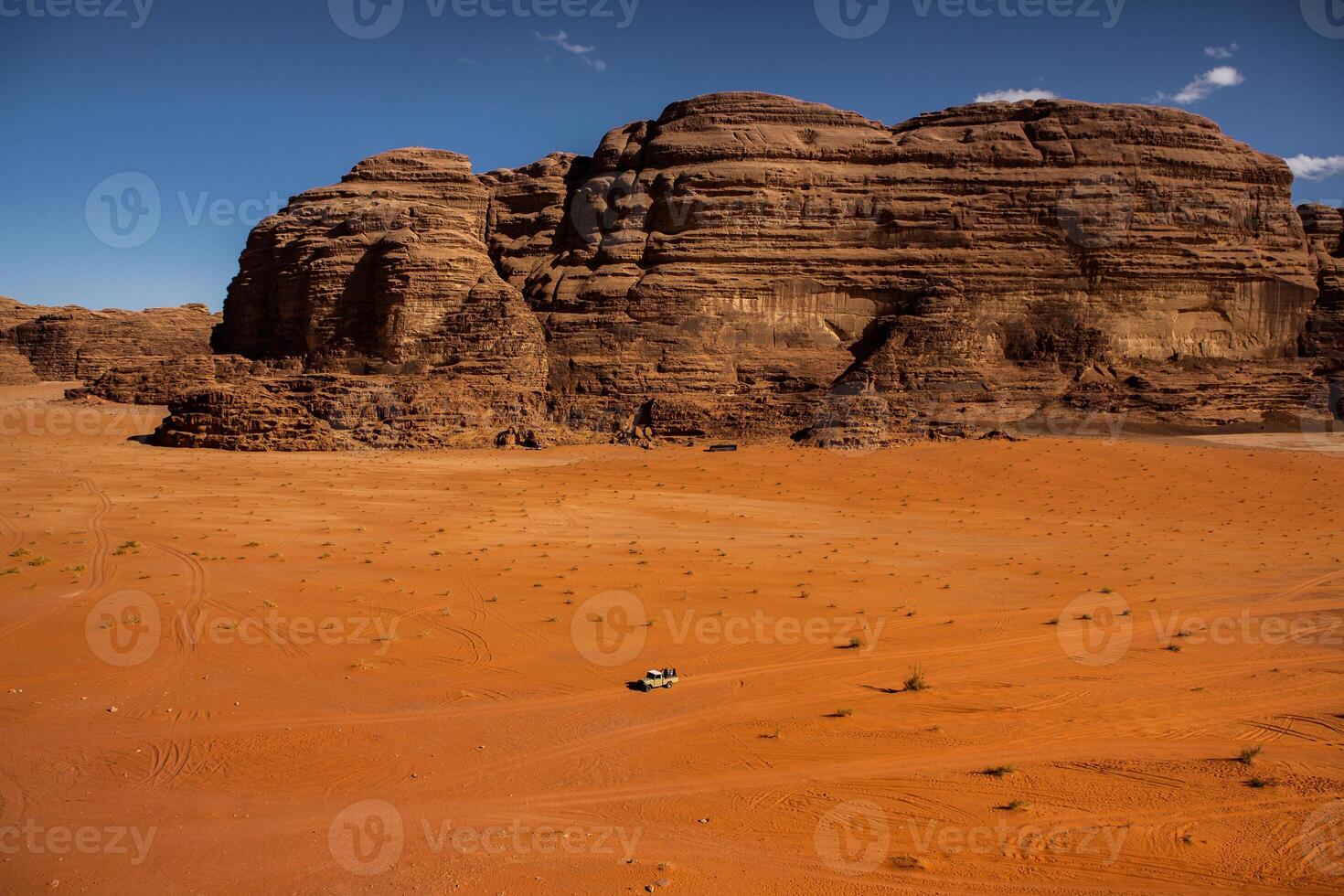 Wadi Rum Desert in Jordan. On the Sunset. Panorama of beautiful sand pattern on the dune. Desert landscape in Jordan. photo