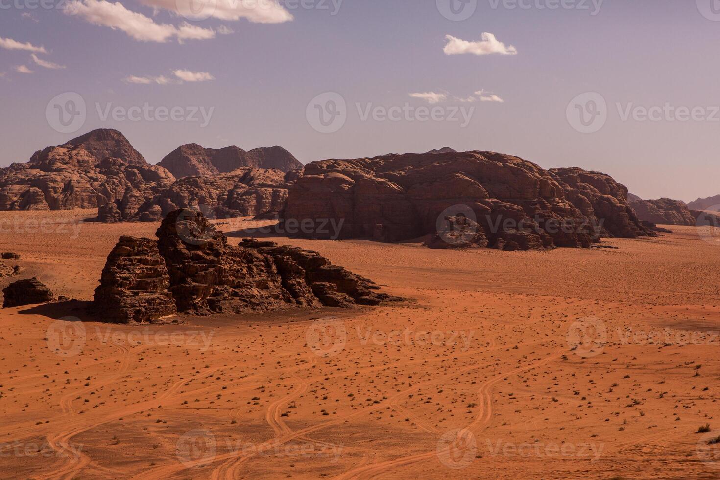 Wadi Rum Desert in Jordan. On the Sunset. Panorama of beautiful sand pattern on the dune. Desert landscape in Jordan. photo
