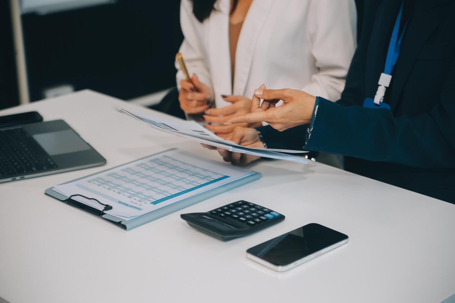 Co working conference, Business team meeting present, investor colleagues discussing new plan financial graph data on office table with laptop and digital tablet, Finance, accounting, investment. photo