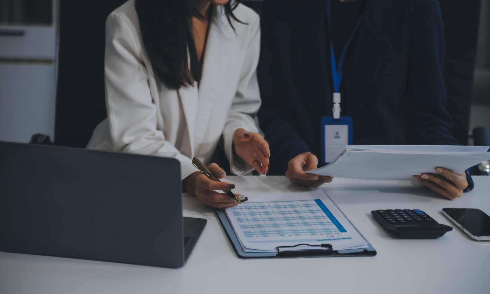 Co working conference, Business team meeting present, investor colleagues discussing new plan financial graph data on office table with laptop and digital tablet, Finance, accounting, investment. photo