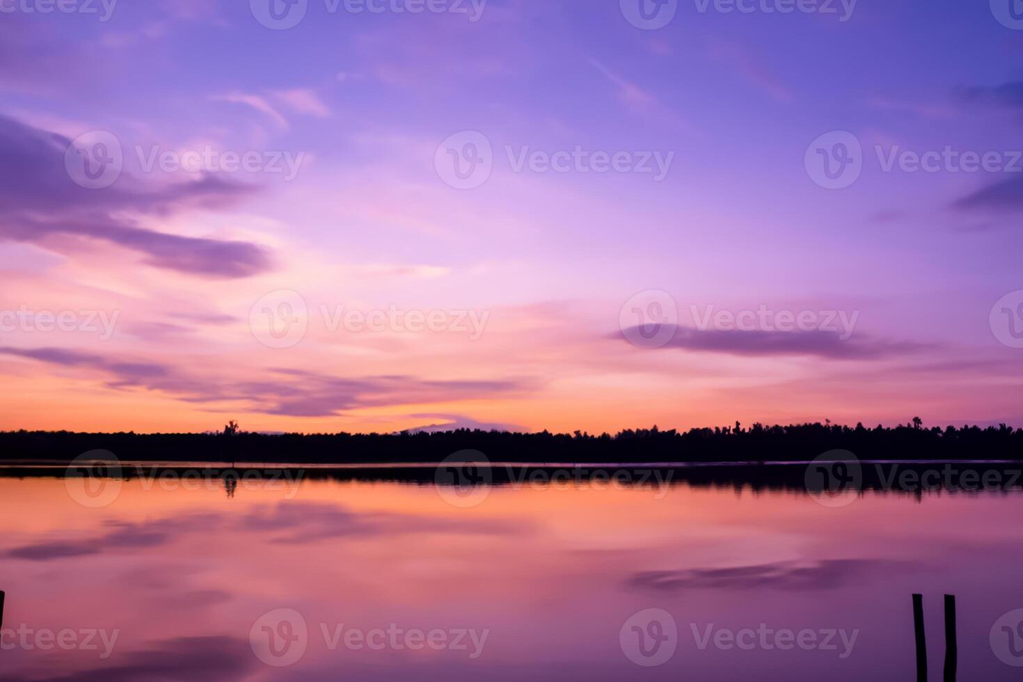 Serene Waters A Blissful Reflection of a Beautiful Pastel Lake and Sky, Where Tranquility Meets Nature's Palette, Creating a Harmonious Oasis of Soft Hues and Ethereal Beauty photo