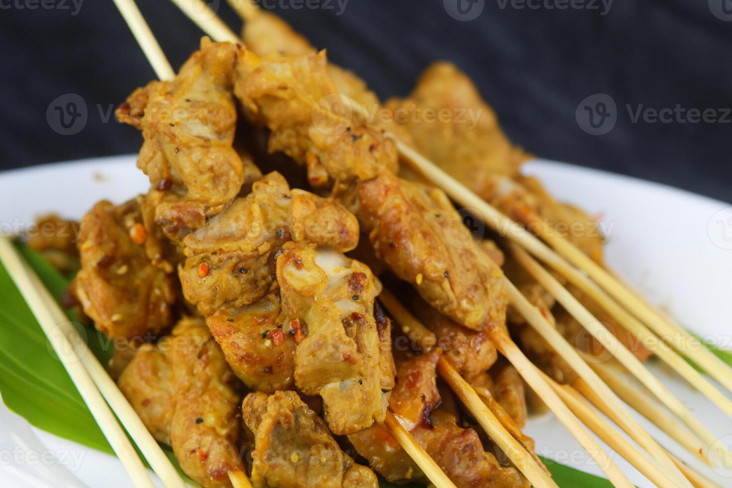 Indulge in the Beauty of Beautiful Satay, Where Skewers of Marinated Delight are Char-Grilled to Golden Perfection, Offering a Symphony of Flavor in Every Bite, a Culinary Artistry to Savor photo