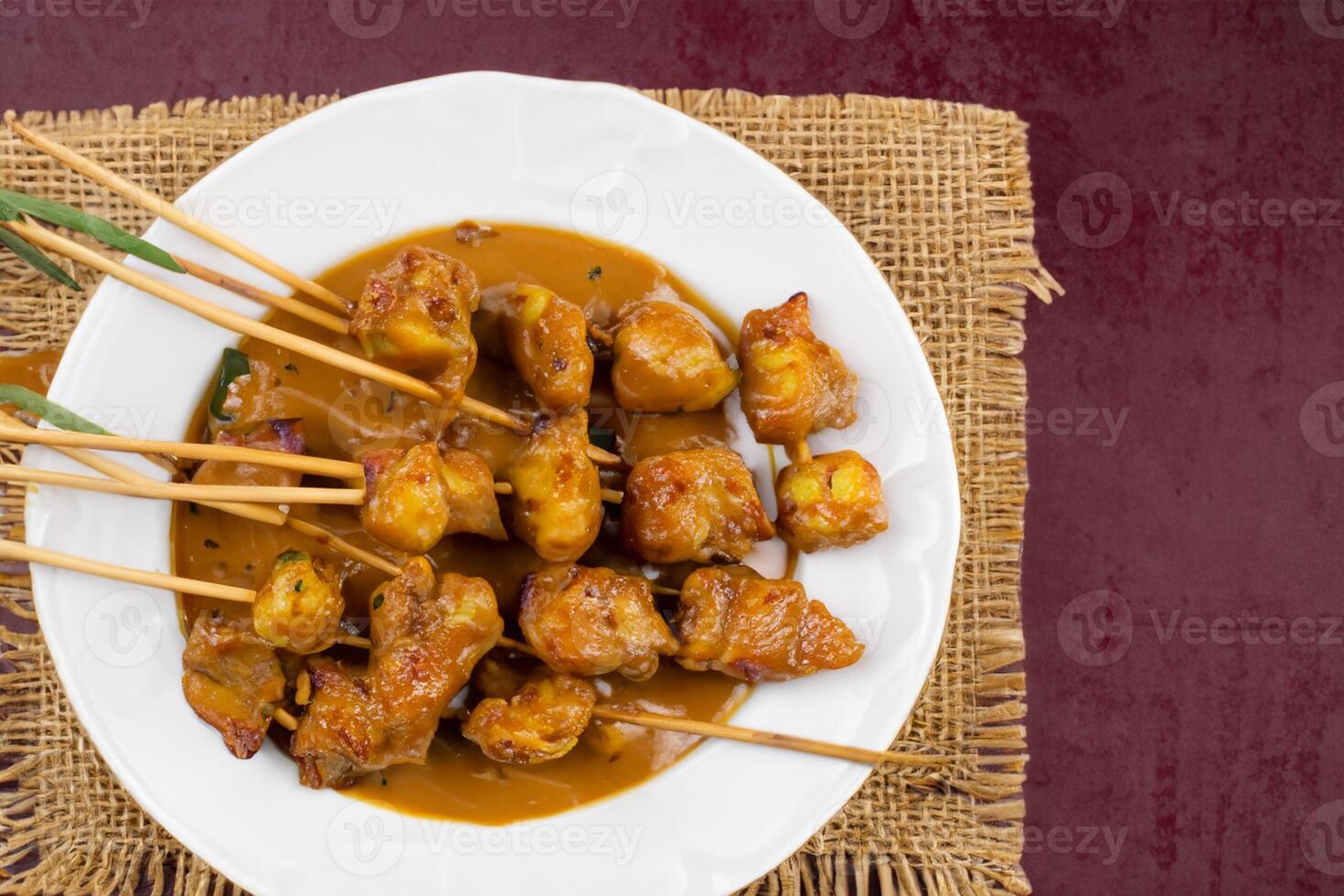 Indulge in the Beauty of Beautiful Satay, Where Skewers of Marinated Delight are Char-Grilled to Golden Perfection, Offering a Symphony of Flavor in Every Bite, a Culinary Artistry to Savor photo