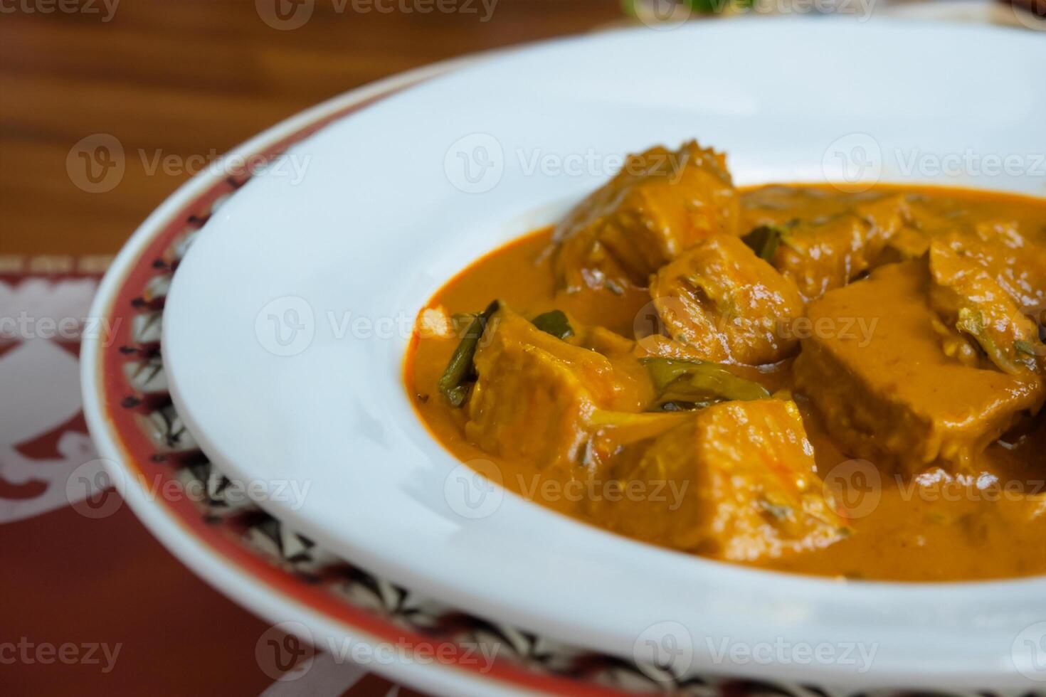 Savor the Exquisite Lamb or Beef Curry Rendang, Ready to Be Relished on Eid al-Adha, Capturing the Essence of Celebration in a Perfect Photo, Showcasing Culinary Mastery and Festive Indulgence photo