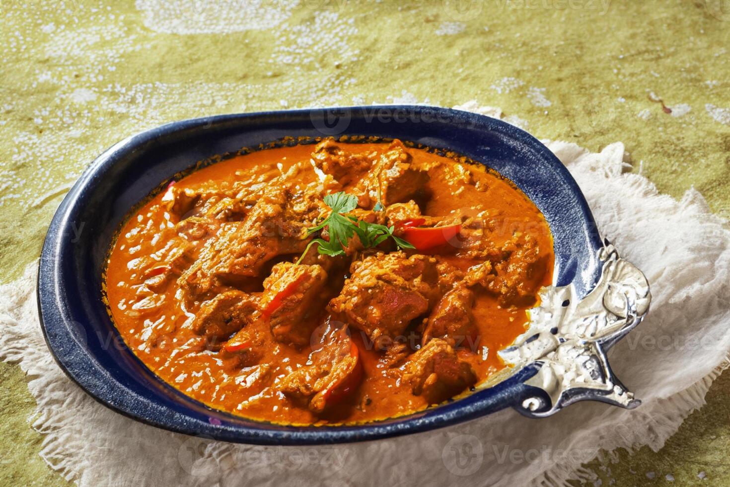 Savor the Exquisite Lamb or Beef Curry Rendang, Ready to Be Relished on Eid al-Adha, Capturing the Essence of Celebration in a Perfect Photo, Showcasing Culinary Mastery and Festive Indulgence photo