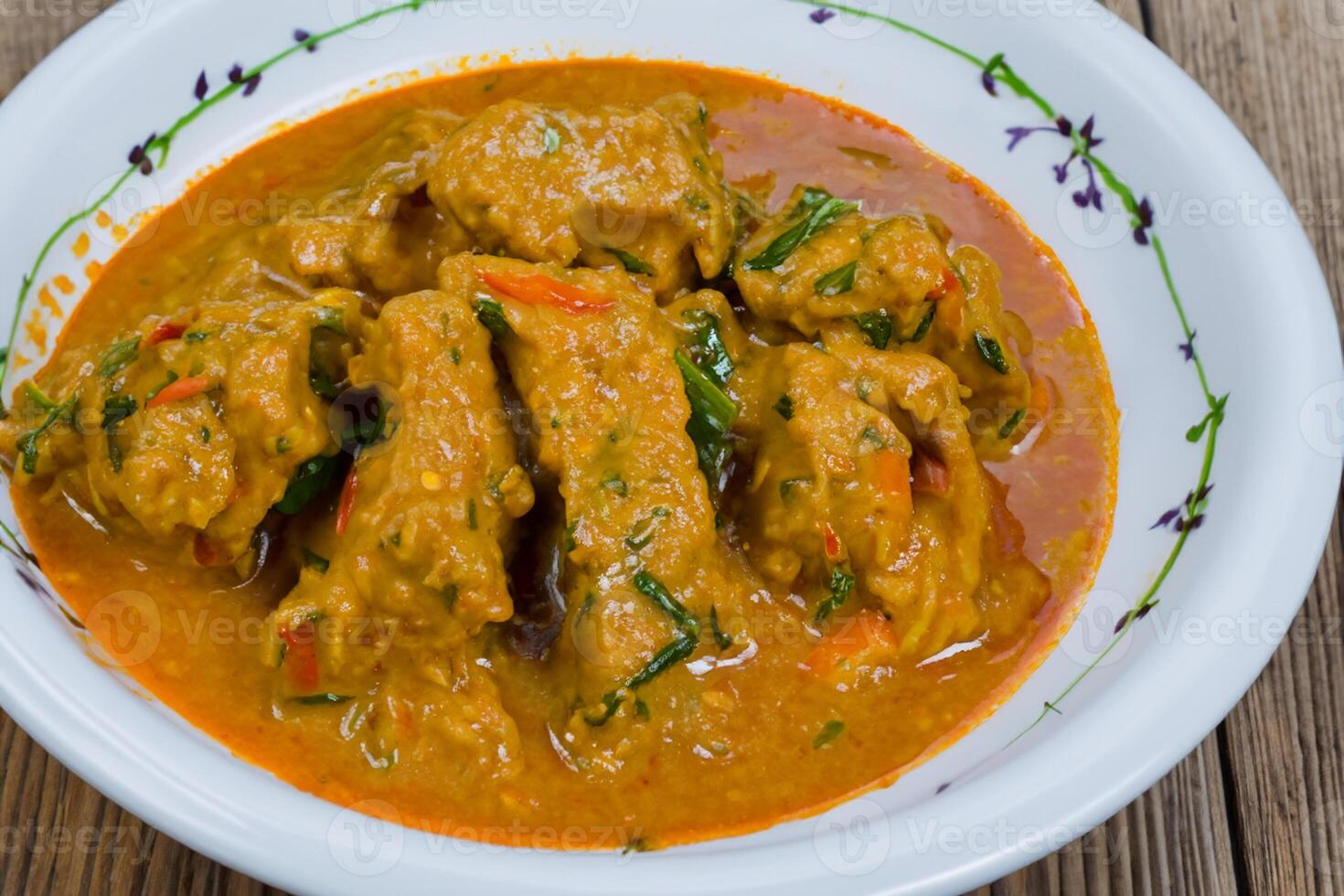 Savor the Exquisite Lamb or Beef Curry Rendang, Ready to Be Relished on Eid al-Adha, Capturing the Essence of Celebration in a Perfect Photo, Showcasing Culinary Mastery and Festive Indulgence photo
