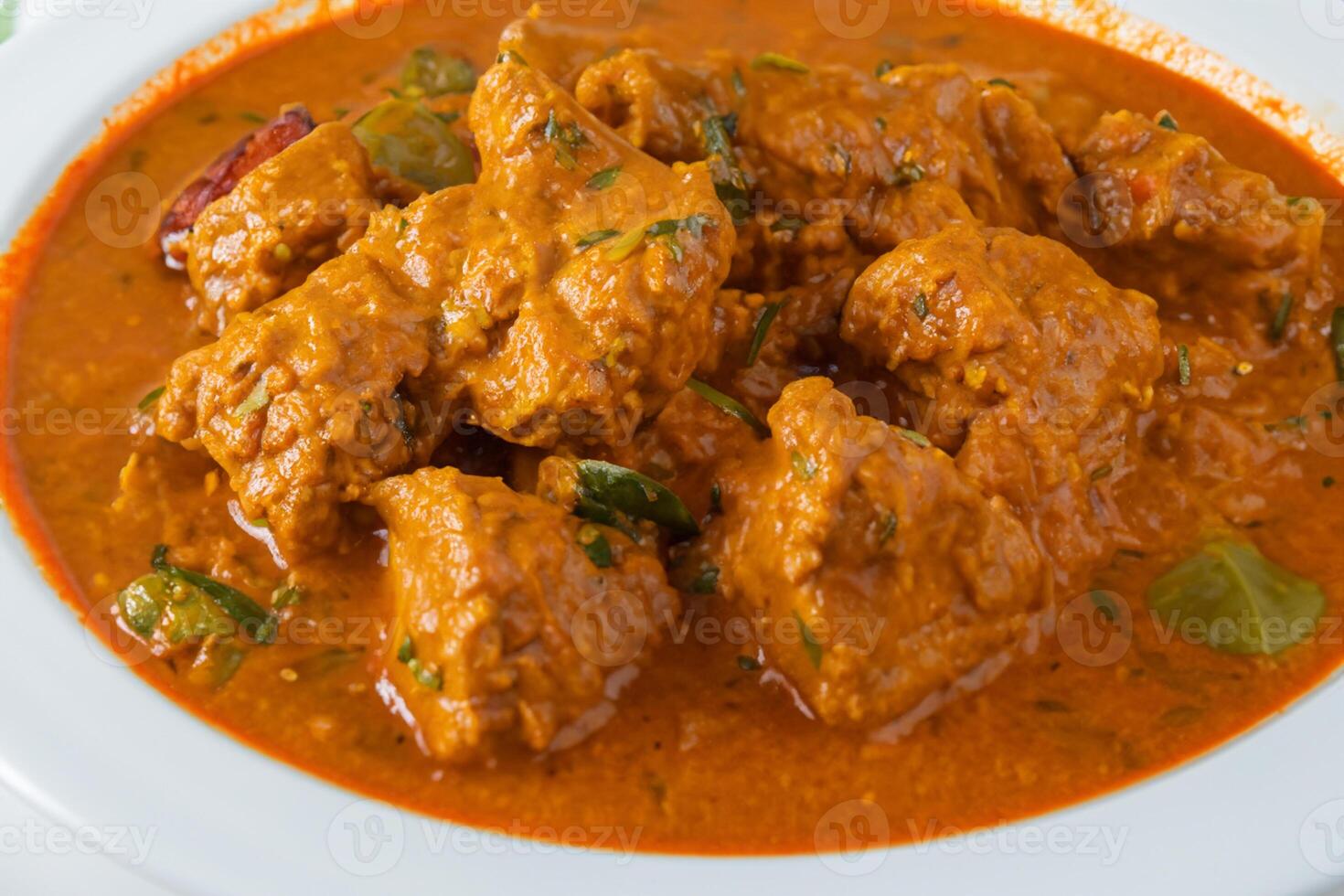 Savor the Exquisite Lamb or Beef Curry Rendang, Ready to Be Relished on Eid al-Adha, Capturing the Essence of Celebration in a Perfect Photo, Showcasing Culinary Mastery and Festive Indulgence photo