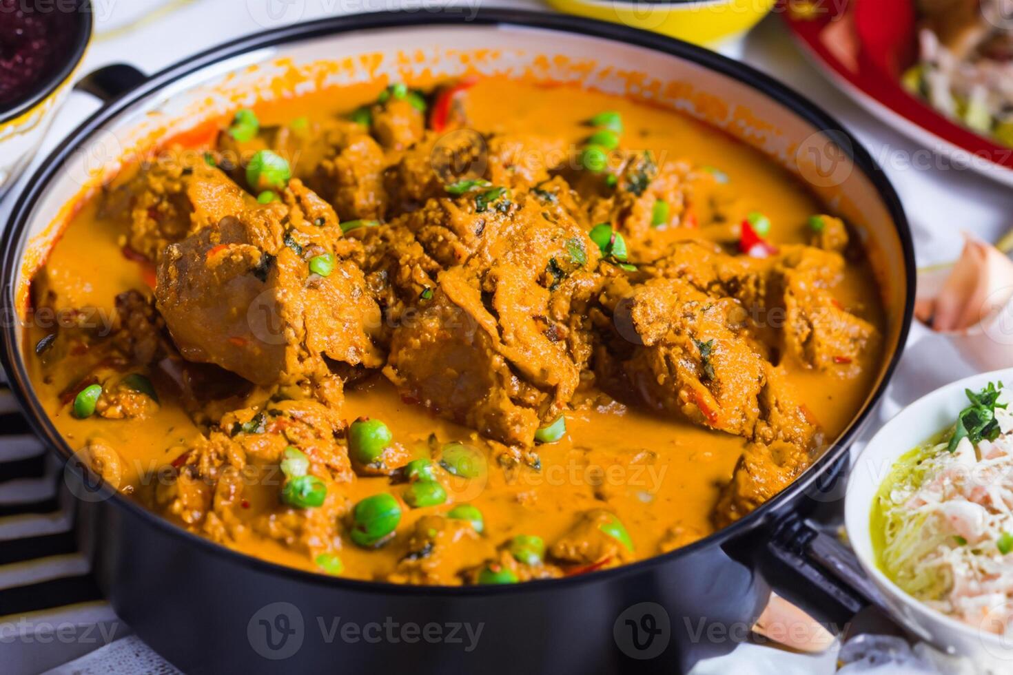 Savor the Exquisite Lamb or Beef Curry Rendang, Ready to Be Relished on Eid al-Adha, Capturing the Essence of Celebration in a Perfect Photo, Showcasing Culinary Mastery and Festive Indulgence photo