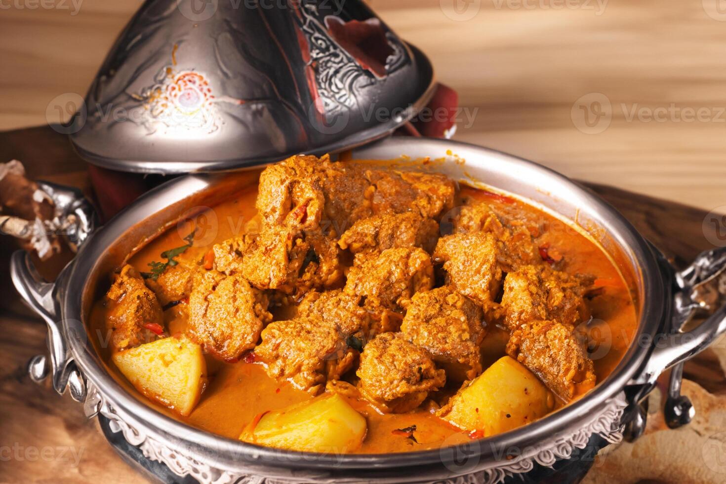 Savor the Exquisite Lamb or Beef Curry Rendang, Ready to Be Relished on Eid al-Adha, Capturing the Essence of Celebration in a Perfect Photo, Showcasing Culinary Mastery and Festive Indulgence photo