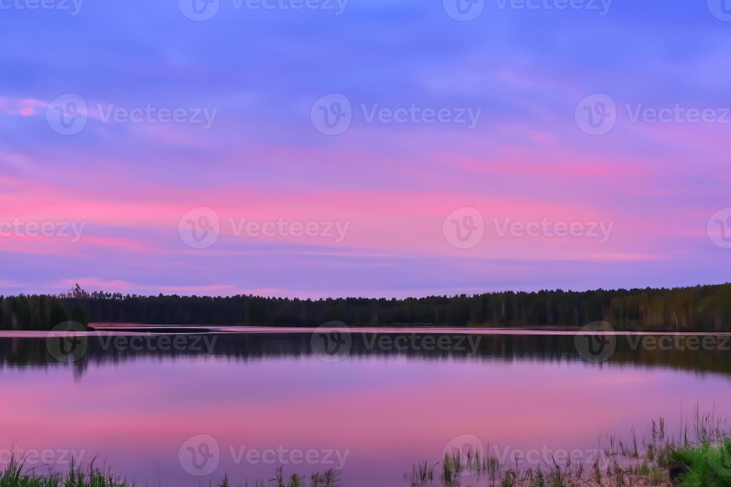 Serene Waters A Blissful Reflection of a Beautiful Pastel Lake and Sky, Where Tranquility Meets Nature's Palette, Creating a Harmonious Oasis of Soft Hues and Ethereal Beauty photo