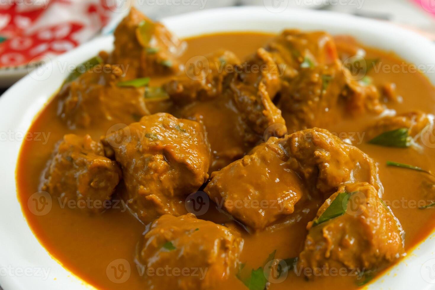 Savor the Exquisite Lamb or Beef Curry Rendang, Ready to Be Relished on Eid al-Adha, Capturing the Essence of Celebration in a Perfect Photo, Showcasing Culinary Mastery and Festive Indulgence photo