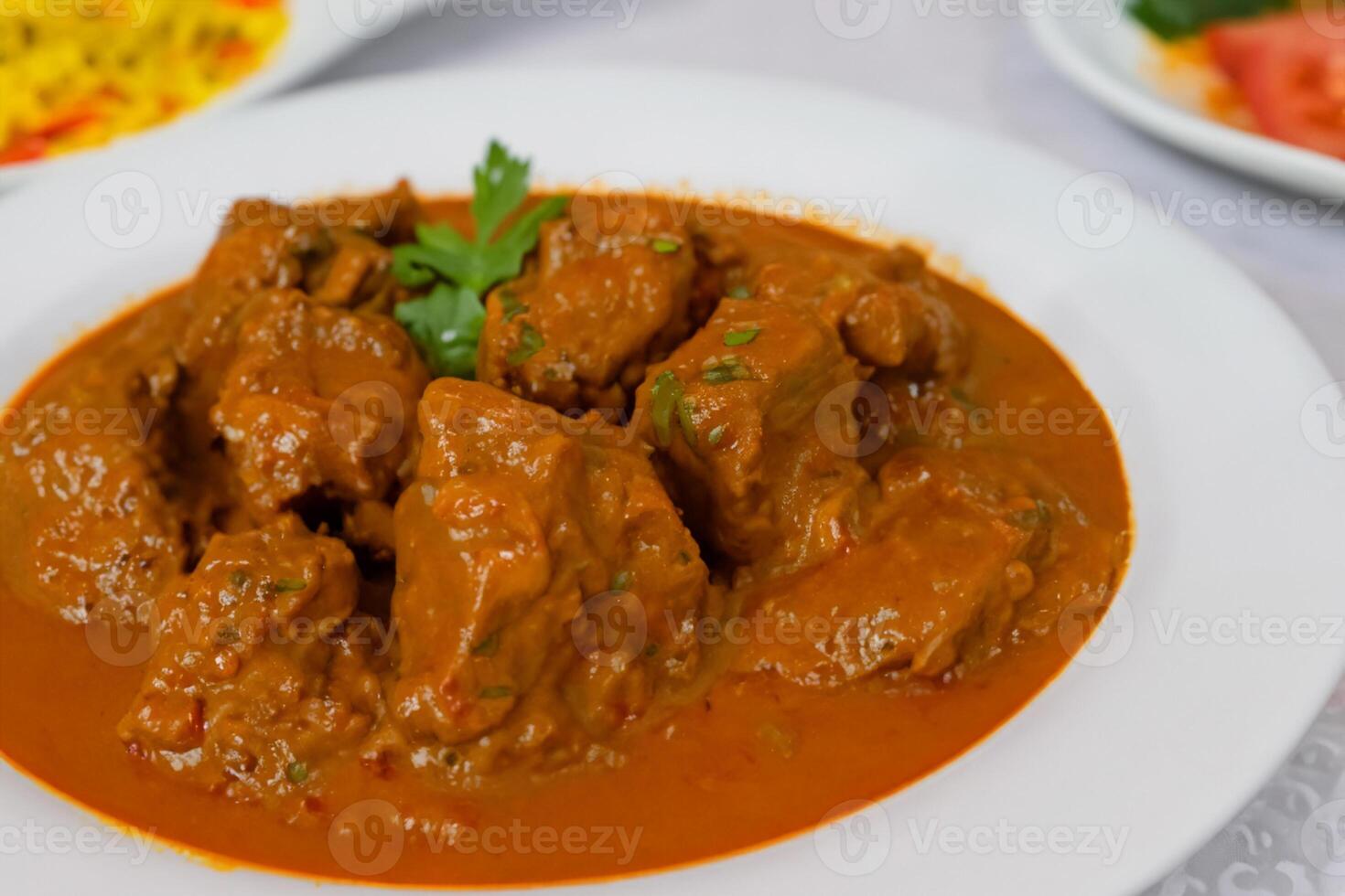 Savor the Exquisite Lamb or Beef Curry Rendang, Ready to Be Relished on Eid al-Adha, Capturing the Essence of Celebration in a Perfect Photo, Showcasing Culinary Mastery and Festive Indulgence photo