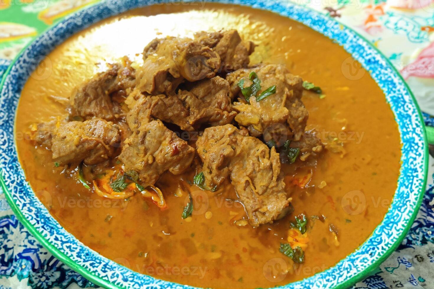Savor the Exquisite Lamb or Beef Curry Rendang, Ready to Be Relished on Eid al-Adha, Capturing the Essence of Celebration in a Perfect Photo, Showcasing Culinary Mastery and Festive Indulgence photo