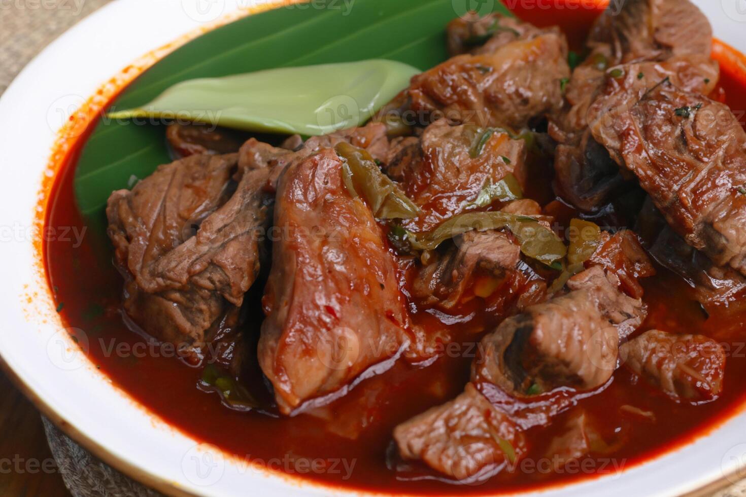 Savor the Exquisite Lamb or Beef Curry Rendang, Ready to Be Relished on Eid al-Adha, Capturing the Essence of Celebration in a Perfect Photo, Showcasing Culinary Mastery and Festive Indulgence photo