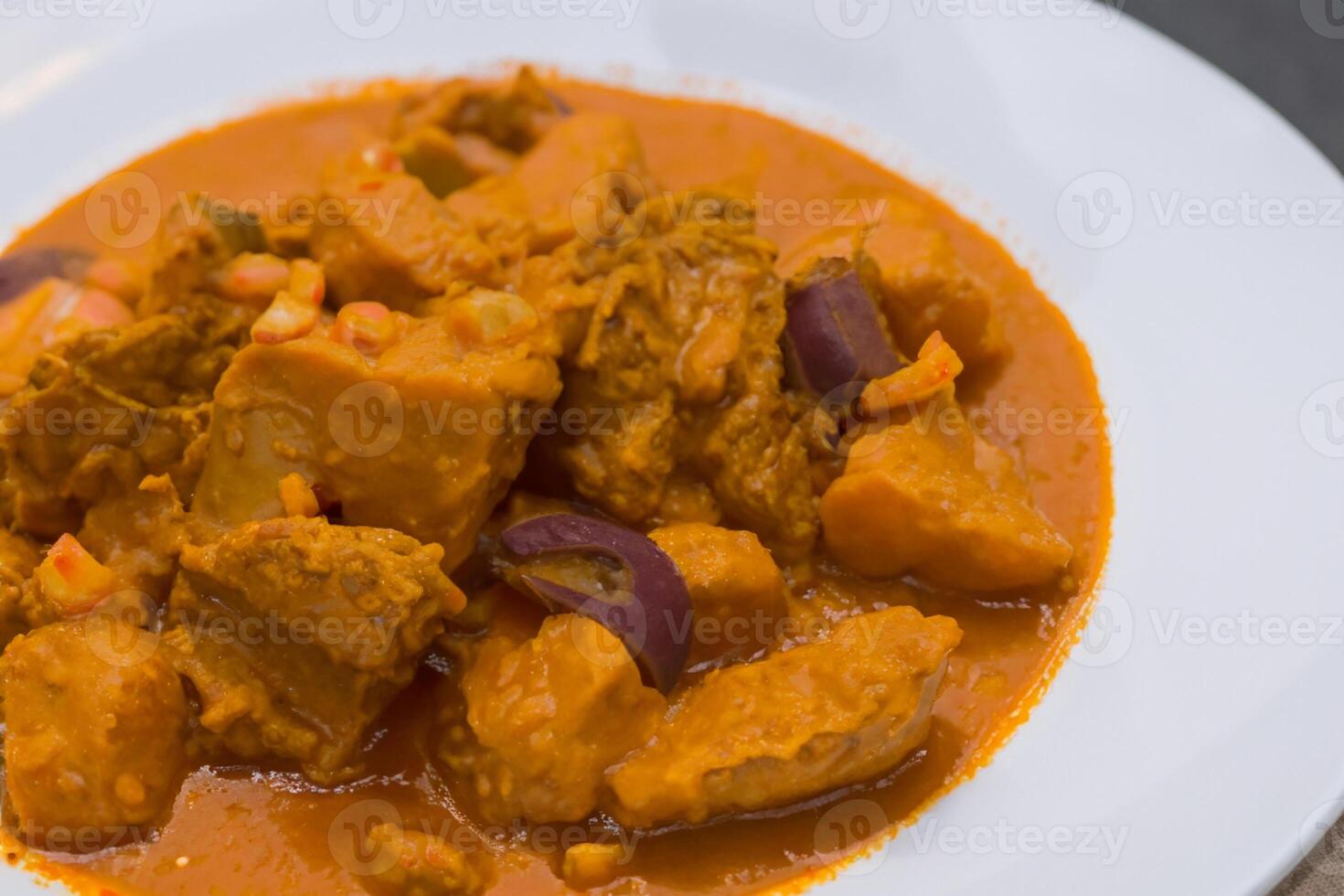 Savor the Exquisite Lamb or Beef Curry Rendang, Ready to Be Relished on Eid al-Adha, Capturing the Essence of Celebration in a Perfect Photo, Showcasing Culinary Mastery and Festive Indulgence photo