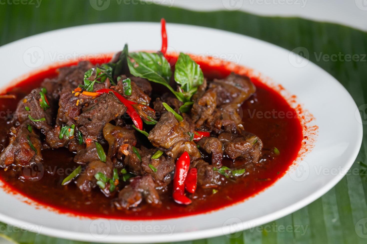 Savor the Exquisite Lamb or Beef Curry Rendang, Ready to Be Relished on Eid al-Adha, Capturing the Essence of Celebration in a Perfect Photo, Showcasing Culinary Mastery and Festive Indulgence photo