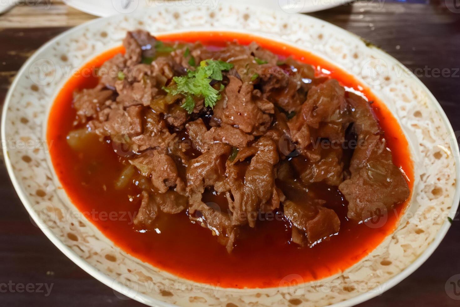 Savor the Exquisite Lamb or Beef Curry Rendang, Ready to Be Relished on Eid al-Adha, Capturing the Essence of Celebration in a Perfect Photo, Showcasing Culinary Mastery and Festive Indulgence photo