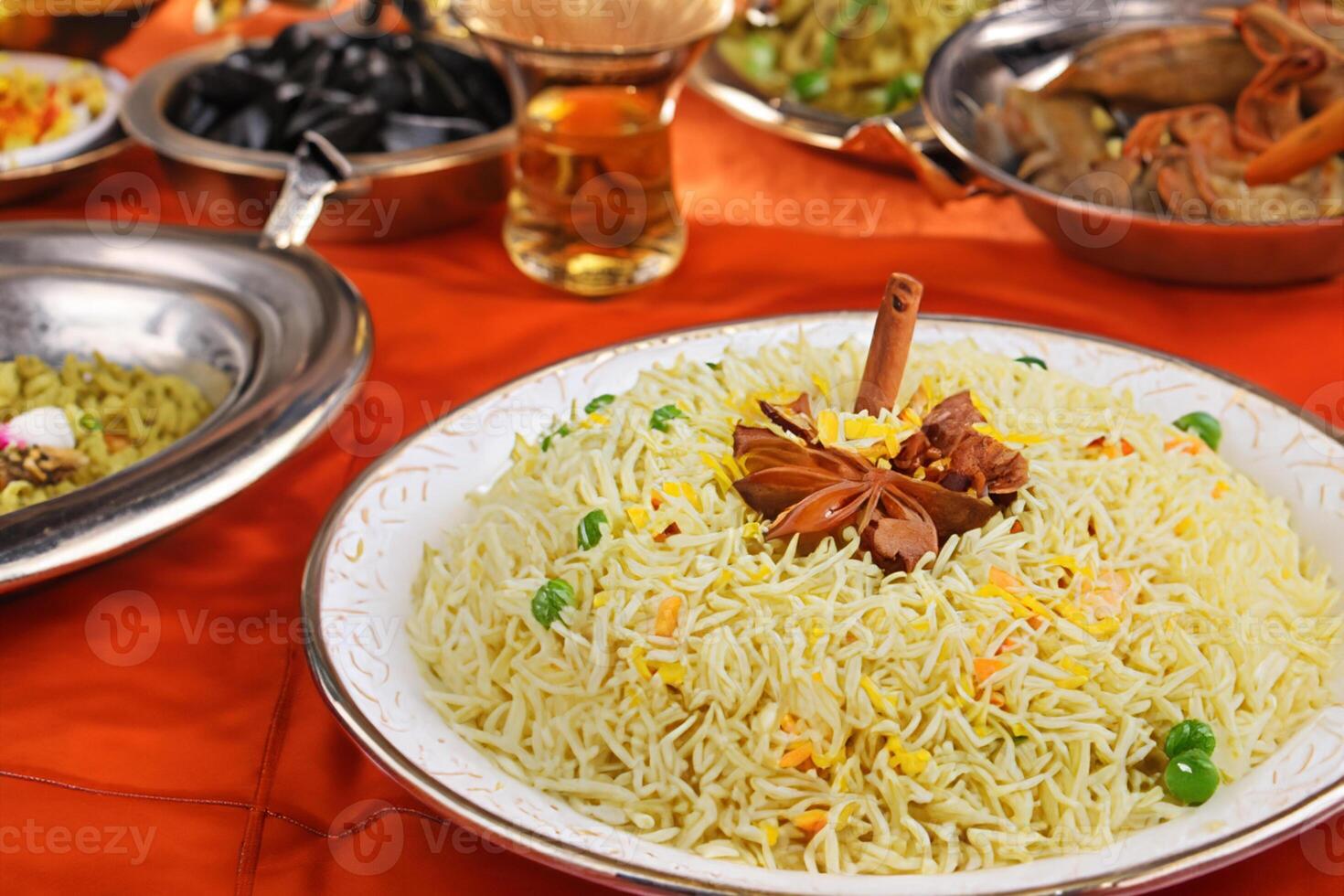 Embark on a Culinary Journey with the Exquisite Aroma and Flavorful Bliss of Kebuli Rice, a Fragrant Middle Eastern Dish Infused with Spices and Savory Perfection, Offering Gastronomic Joy. photo