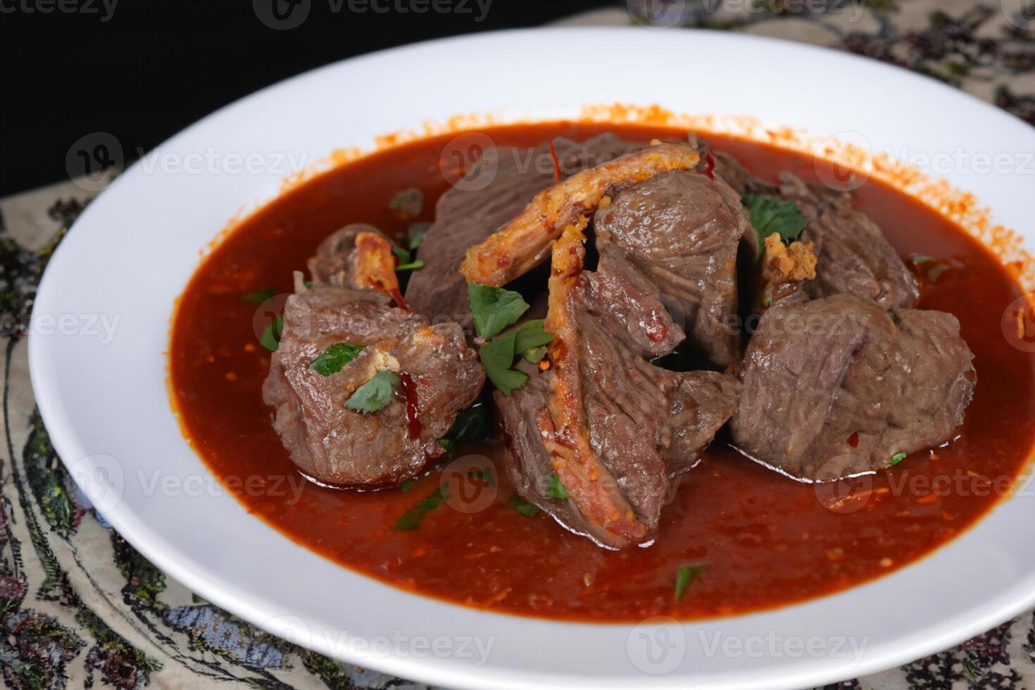 Savor the Exquisite Lamb or Beef Curry Rendang, Ready to Be Relished on Eid al-Adha, Capturing the Essence of Celebration in a Perfect Photo, Showcasing Culinary Mastery and Festive Indulgence photo