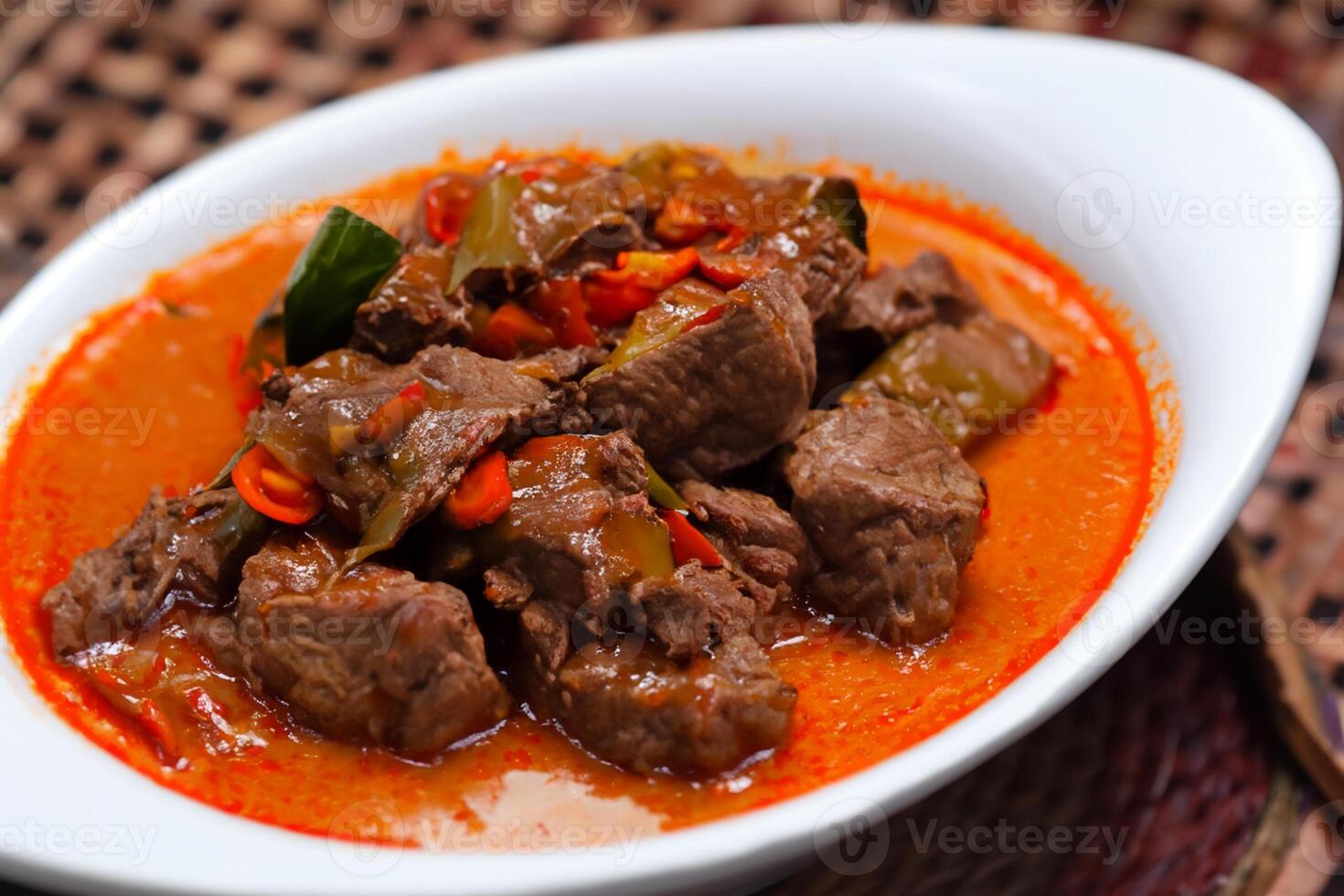 Savor the Exquisite Lamb or Beef Curry Rendang, Ready to Be Relished on Eid al-Adha, Capturing the Essence of Celebration in a Perfect Photo, Showcasing Culinary Mastery and Festive Indulgence photo