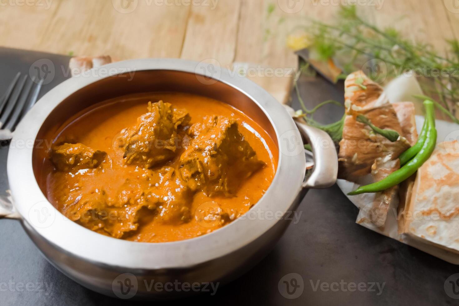 Savor the Exquisite Lamb or Beef Curry Rendang, Ready to Be Relished on Eid al-Adha, Capturing the Essence of Celebration in a Perfect Photo, Showcasing Culinary Mastery and Festive Indulgence photo