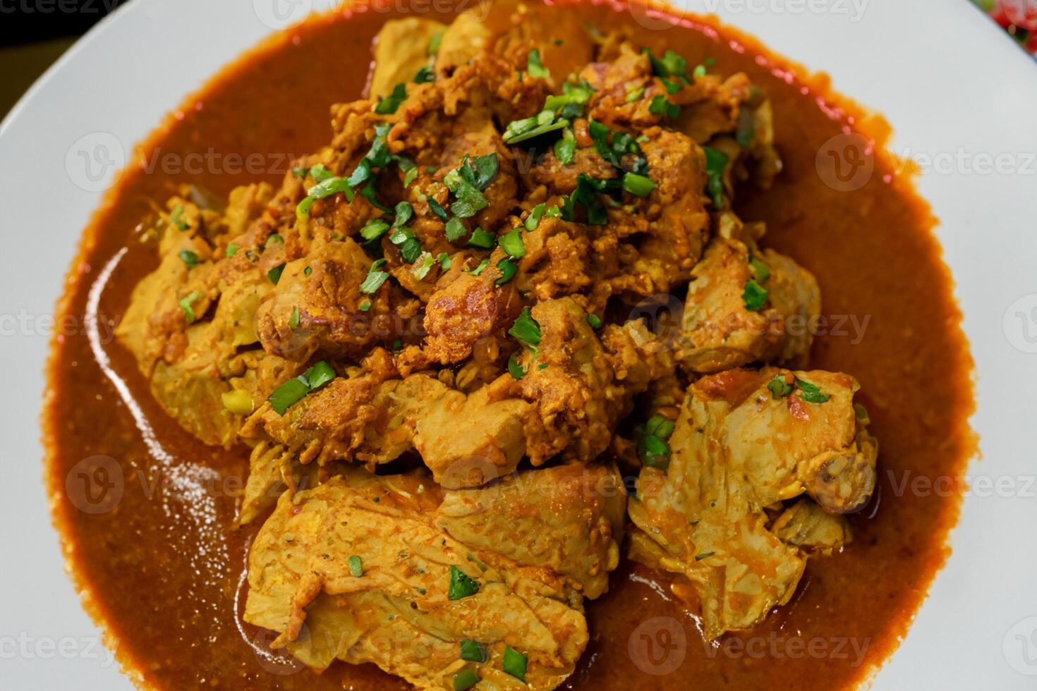 Savor the Exquisite Lamb or Beef Curry Rendang, Ready to Be Relished on Eid al-Adha, Capturing the Essence of Celebration in a Perfect Photo, Showcasing Culinary Mastery and Festive Indulgence photo