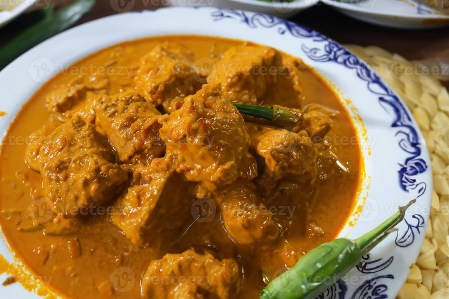Savor the Exquisite Lamb or Beef Curry Rendang, Ready to Be Relished on Eid al-Adha, Capturing the Essence of Celebration in a Perfect Photo, Showcasing Culinary Mastery and Festive Indulgence photo