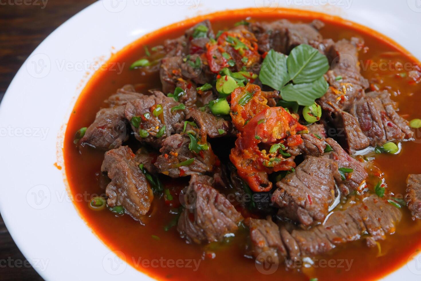 Savor the Exquisite Lamb or Beef Curry Rendang, Ready to Be Relished on Eid al-Adha, Capturing the Essence of Celebration in a Perfect Photo, Showcasing Culinary Mastery and Festive Indulgence photo
