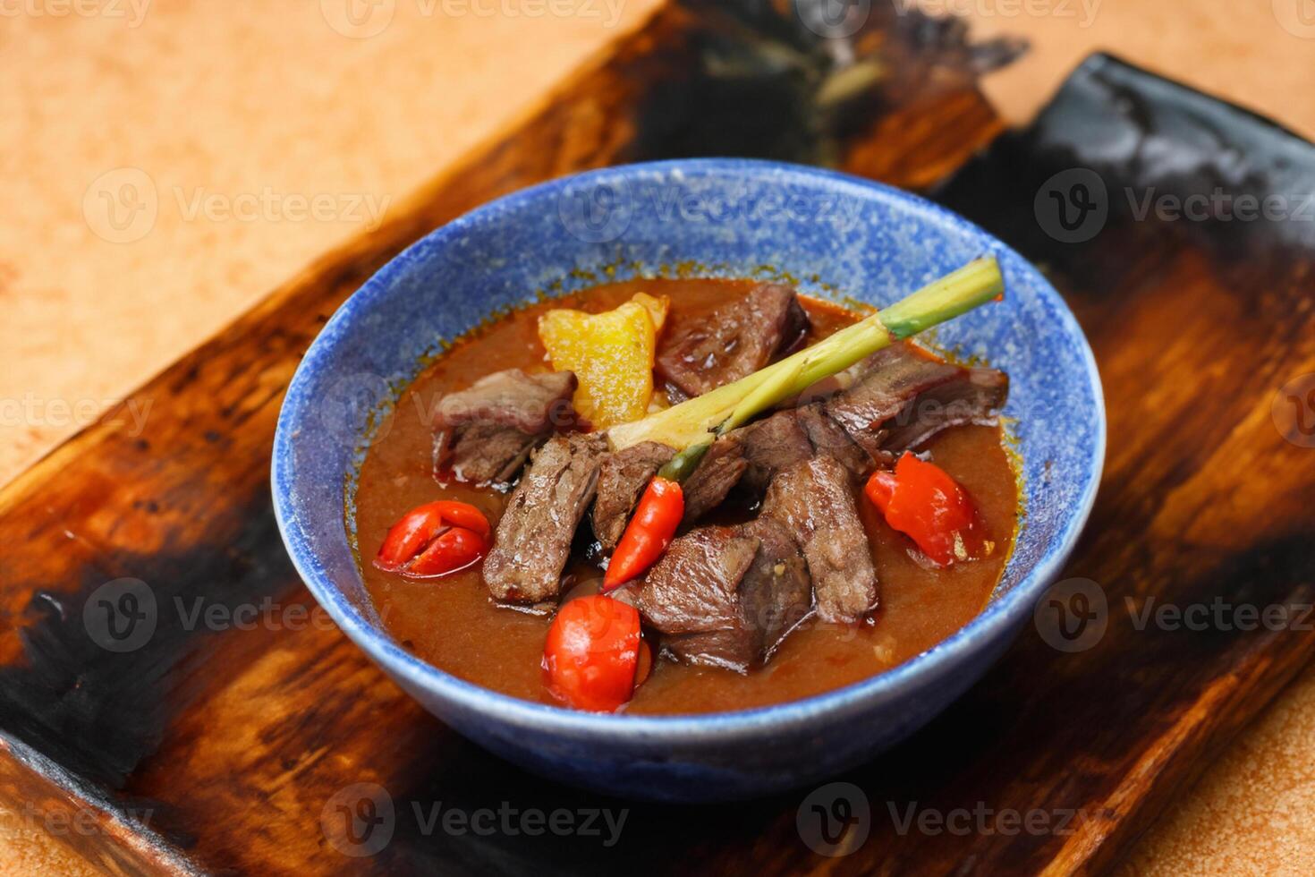 Savor the Exquisite Lamb or Beef Curry Rendang, Ready to Be Relished on Eid al-Adha, Capturing the Essence of Celebration in a Perfect Photo, Showcasing Culinary Mastery and Festive Indulgence photo