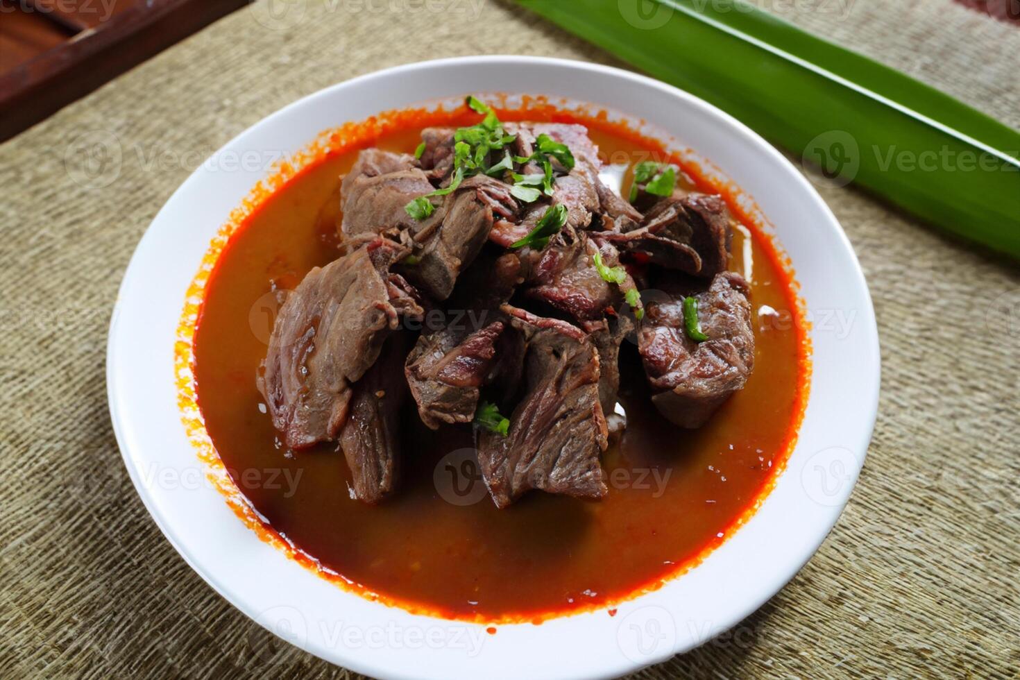 Savor the Exquisite Lamb or Beef Curry Rendang, Ready to Be Relished on Eid al-Adha, Capturing the Essence of Celebration in a Perfect Photo, Showcasing Culinary Mastery and Festive Indulgence photo