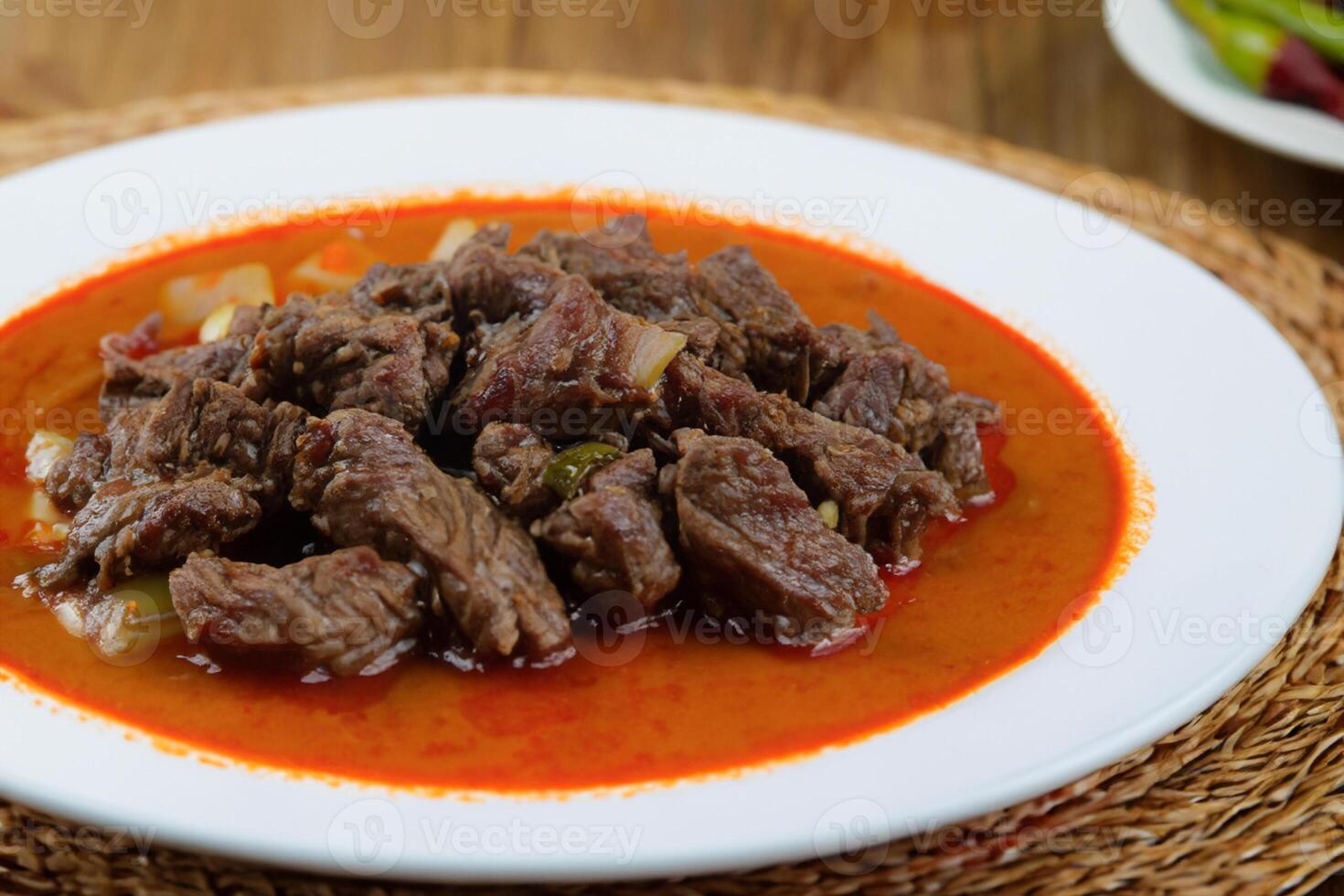 Savor the Exquisite Lamb or Beef Curry Rendang, Ready to Be Relished on Eid al-Adha, Capturing the Essence of Celebration in a Perfect Photo, Showcasing Culinary Mastery and Festive Indulgence photo