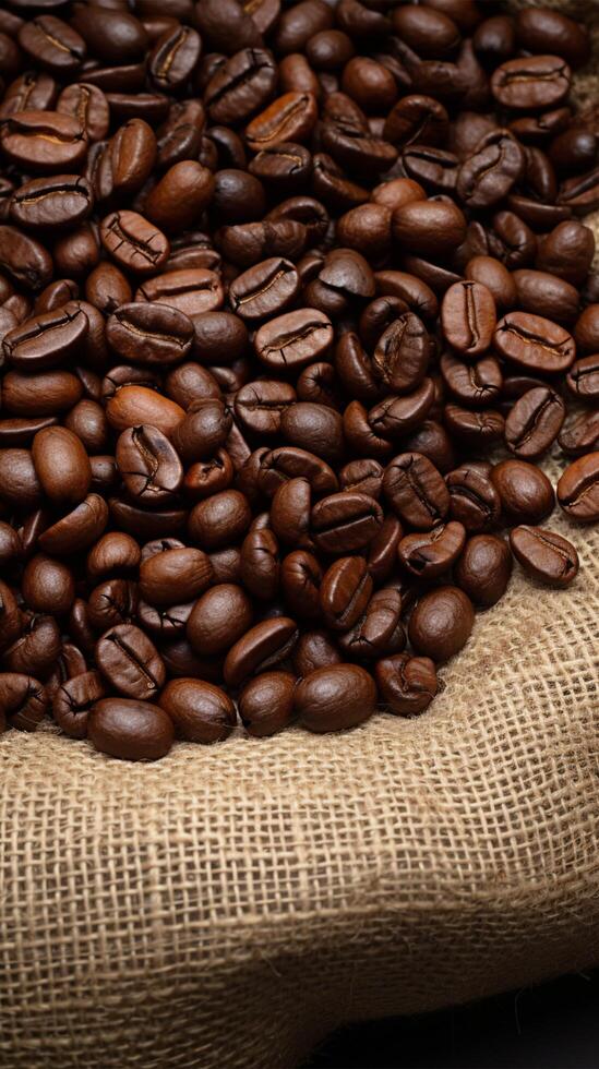 AI generated Roasted coffee beans on traditional sack textile, creating a warm background Vertical Mobile Wallpaper photo