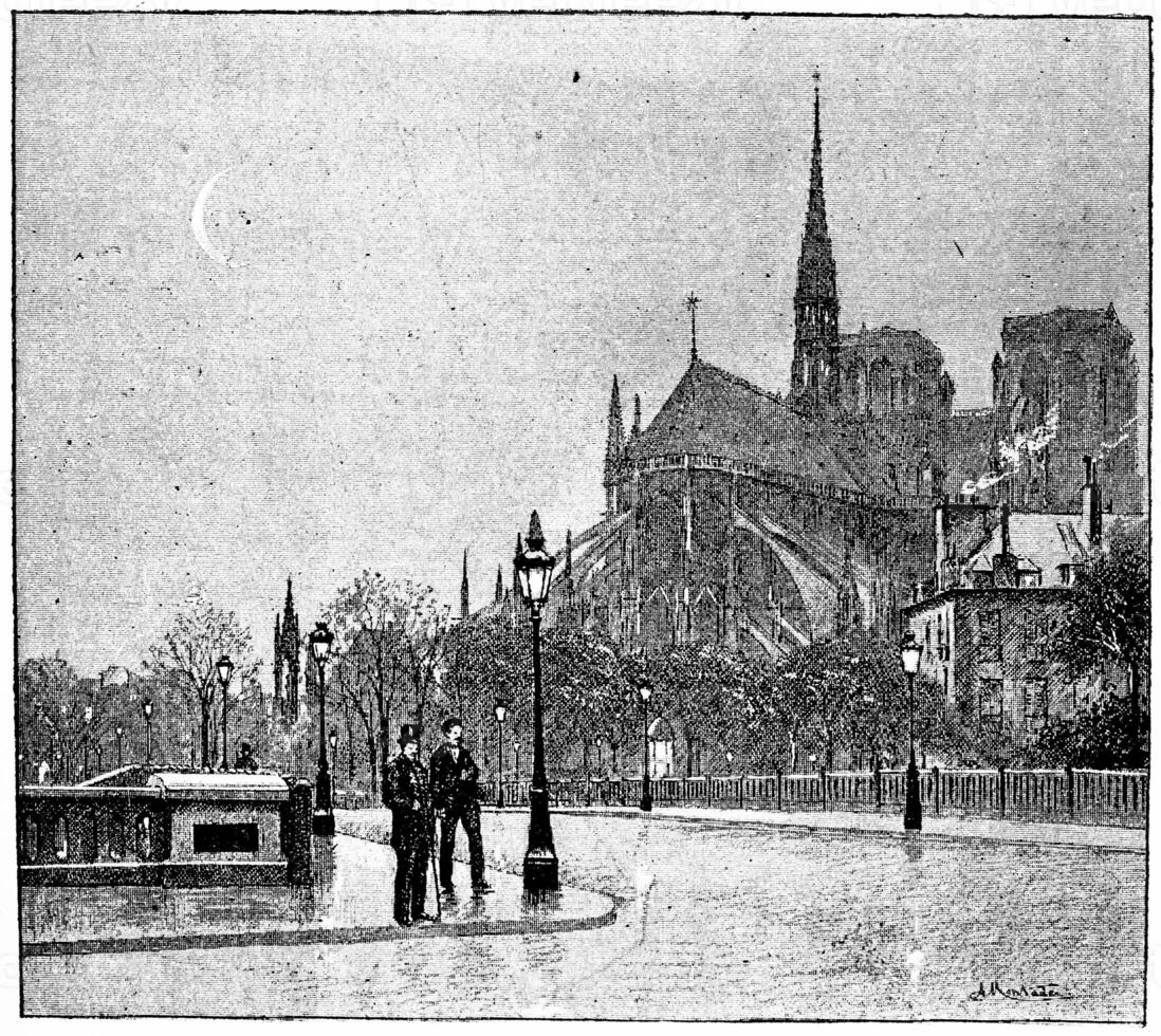 The apse of Notre Dame seen from St. Louis bridge, vintage engraving. photo