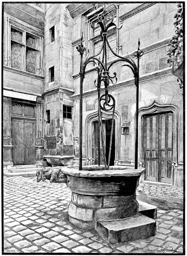 The old well of the court entrance, vintage engraving. photo