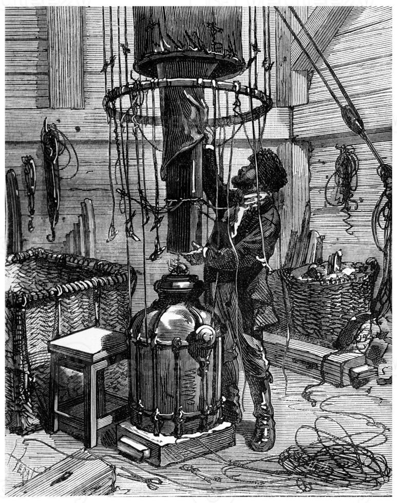 He collected the parts forming the unit, the hot air flowed into the enormous globe, vintage engraving. photo