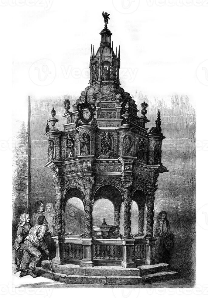 Oak baptistery of the church of Guimiliau, Finistere, vintage engraving. photo