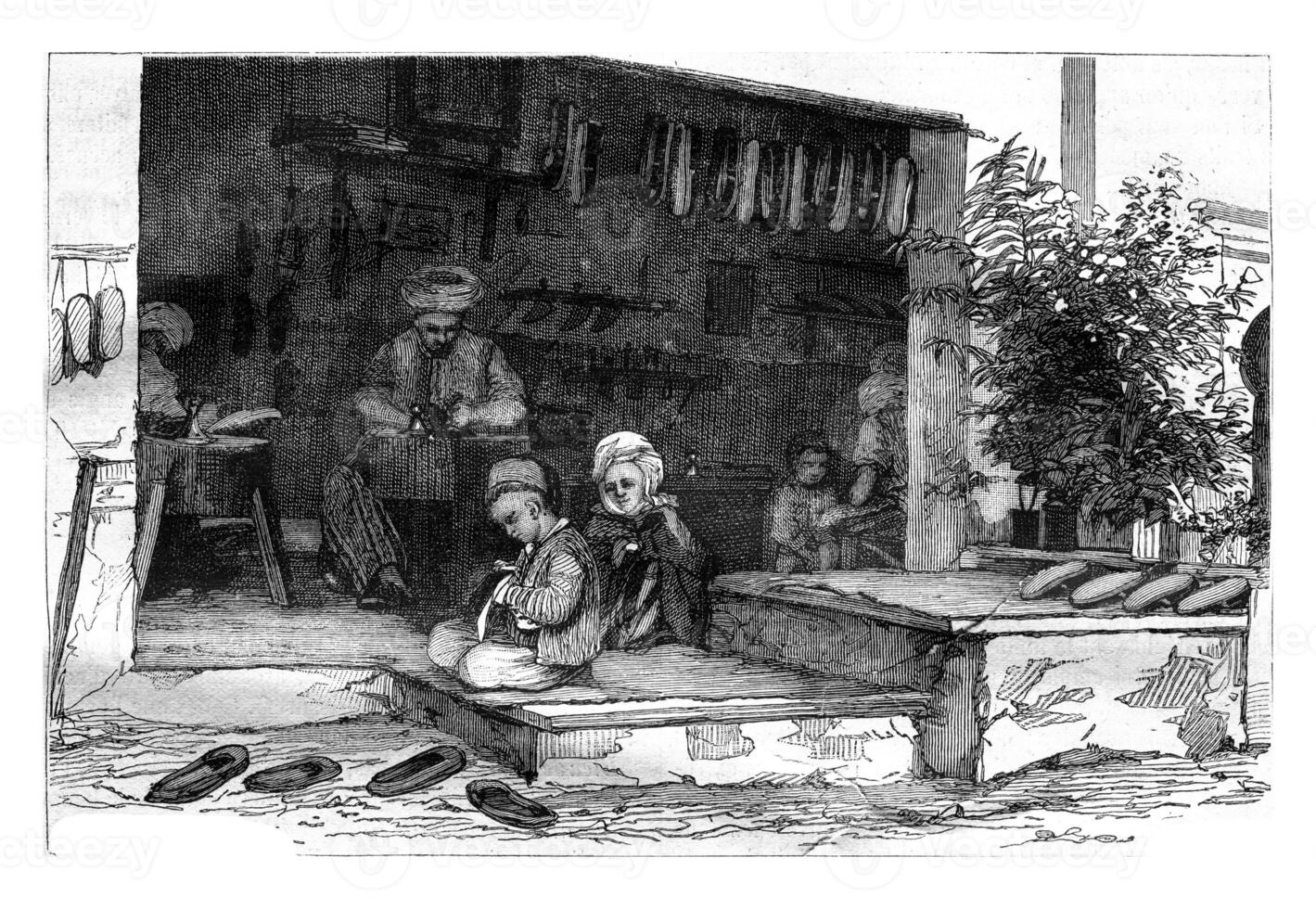 A shoemaker's shop in Constantine, vintage engraving. photo