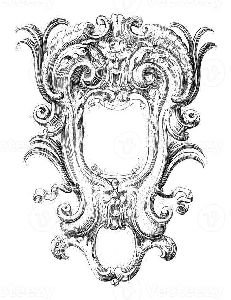 Cartouche decorated with two masks photo