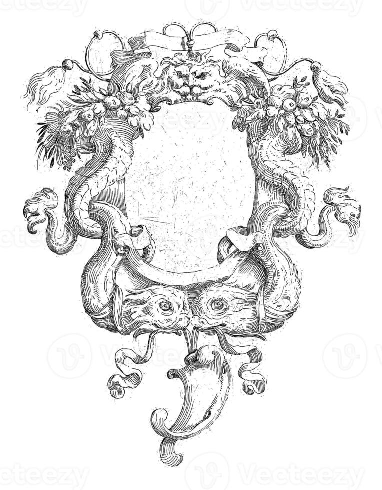Cartouche with winged mask and two fishes photo