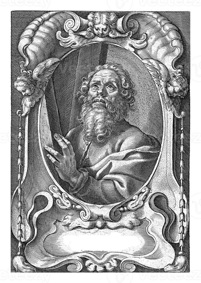 Apostle Andreas with cross in frame with architectural ornaments photo