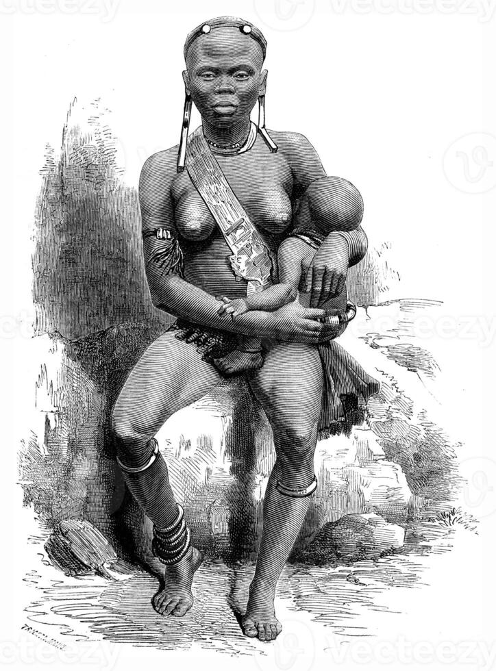 Pahouins warriors, vintage engraving. photo