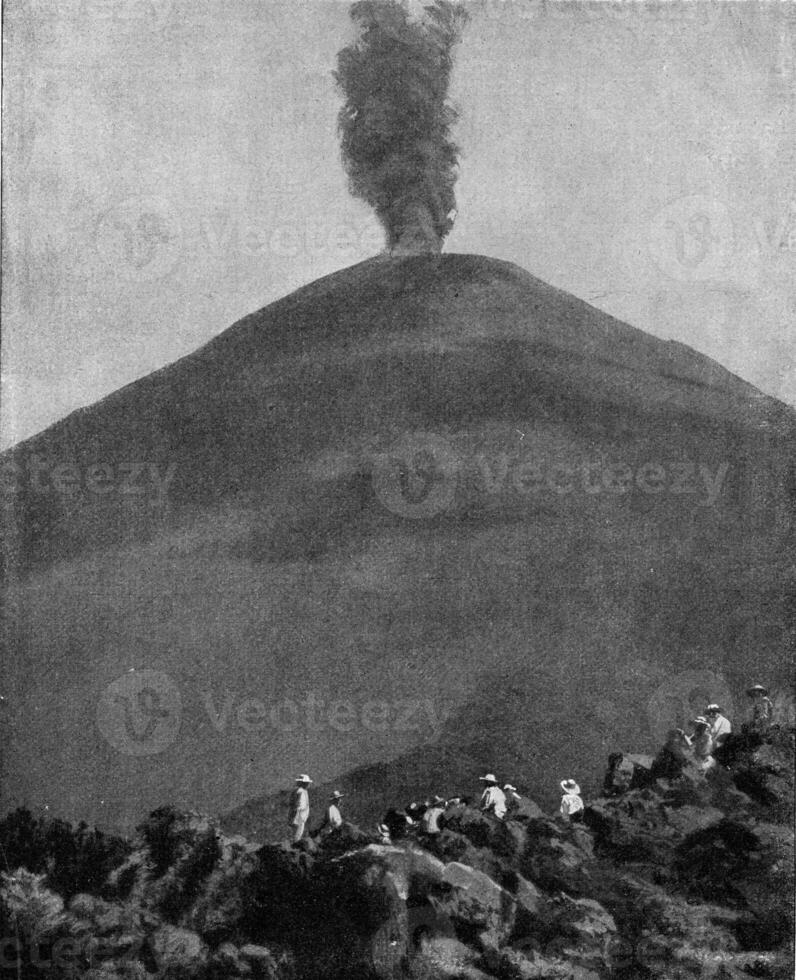 The Izalco volcano in El Salvador, increased 800 meters in 100 years, vintage engraving. photo