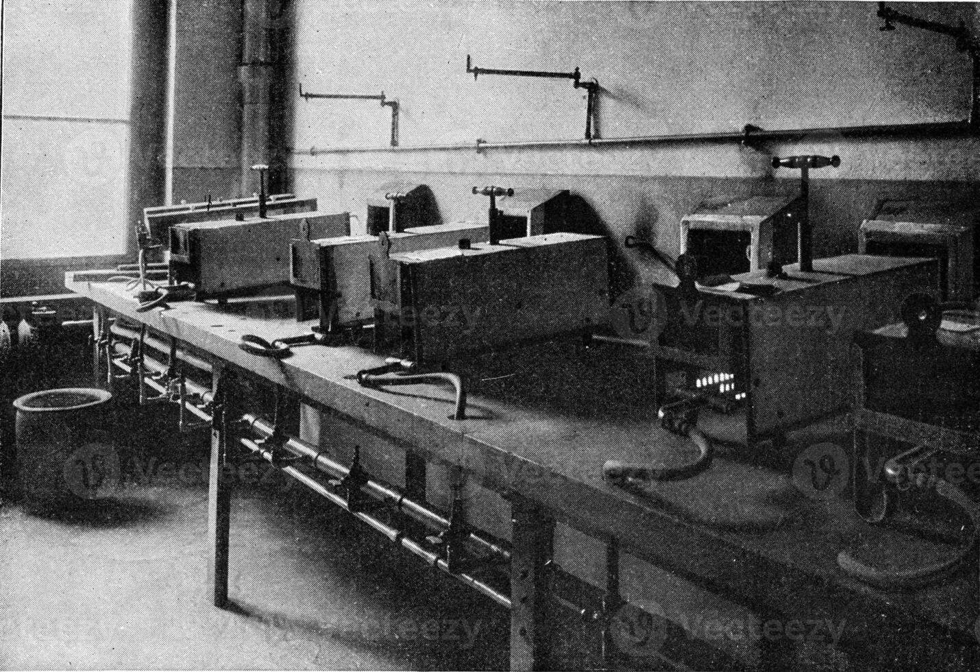 Muffle furnaces in a modern laboratory, vintage engraving. photo