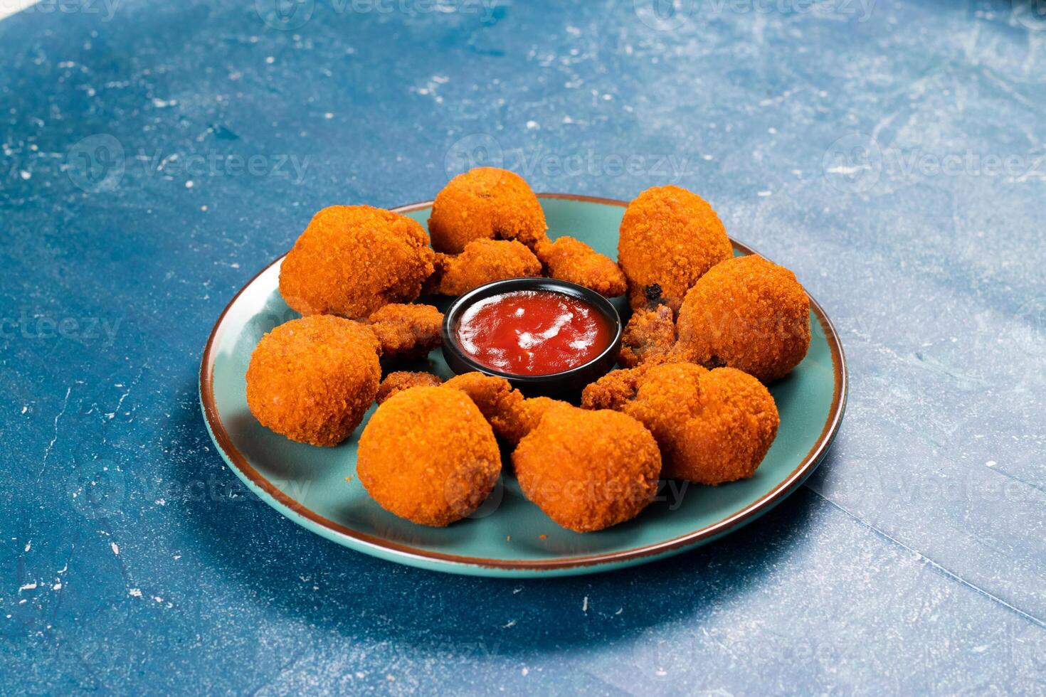 Deep fried Chicken Lolipop or Chicken drumstick with tomato sauce and mayo dip served in a dish isolated on background side view photo