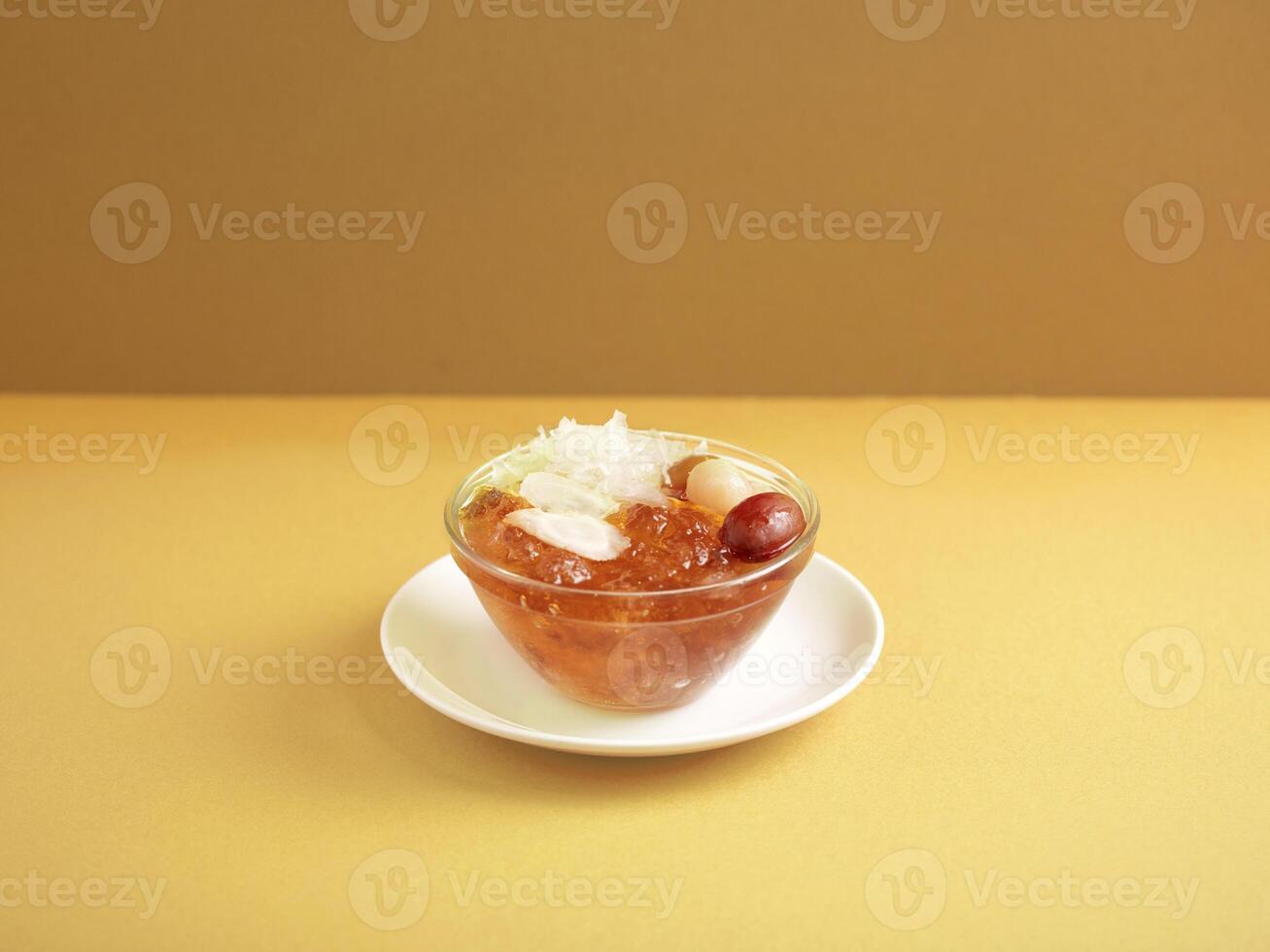 Double-boiled Peach Resin with American Ginseng served in a bowl isolated on mat side view on grey background photo