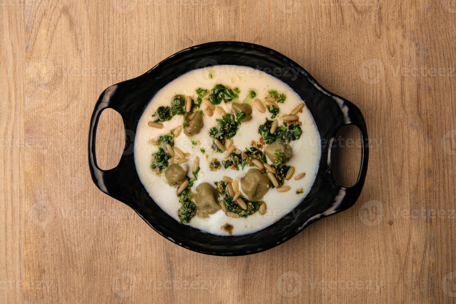 Shish Barak With Vermicelli rice served in dish isolated on table top view of arabian food photo