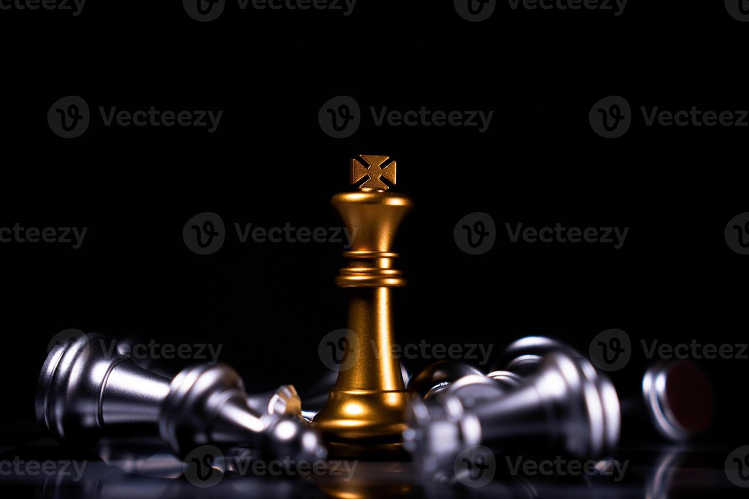 Golden King chess is last standing in the chess board, Concept of successful business leadership photo