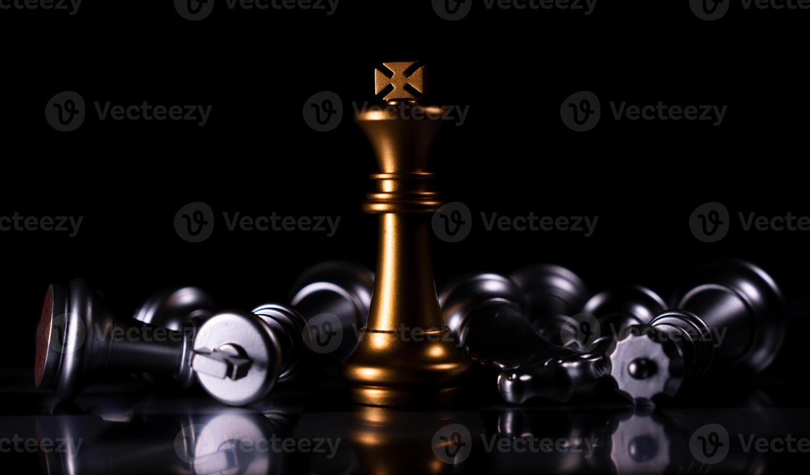 Golden King chess is last standing in the chess board, Concept of successful business leadership photo