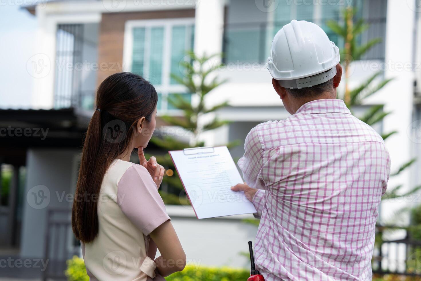 Senior home inspector explains Inspection results with homeowner, handyman holding clipboard and after checking details before renovations home, house improvement interior, Interior design Real estate photo