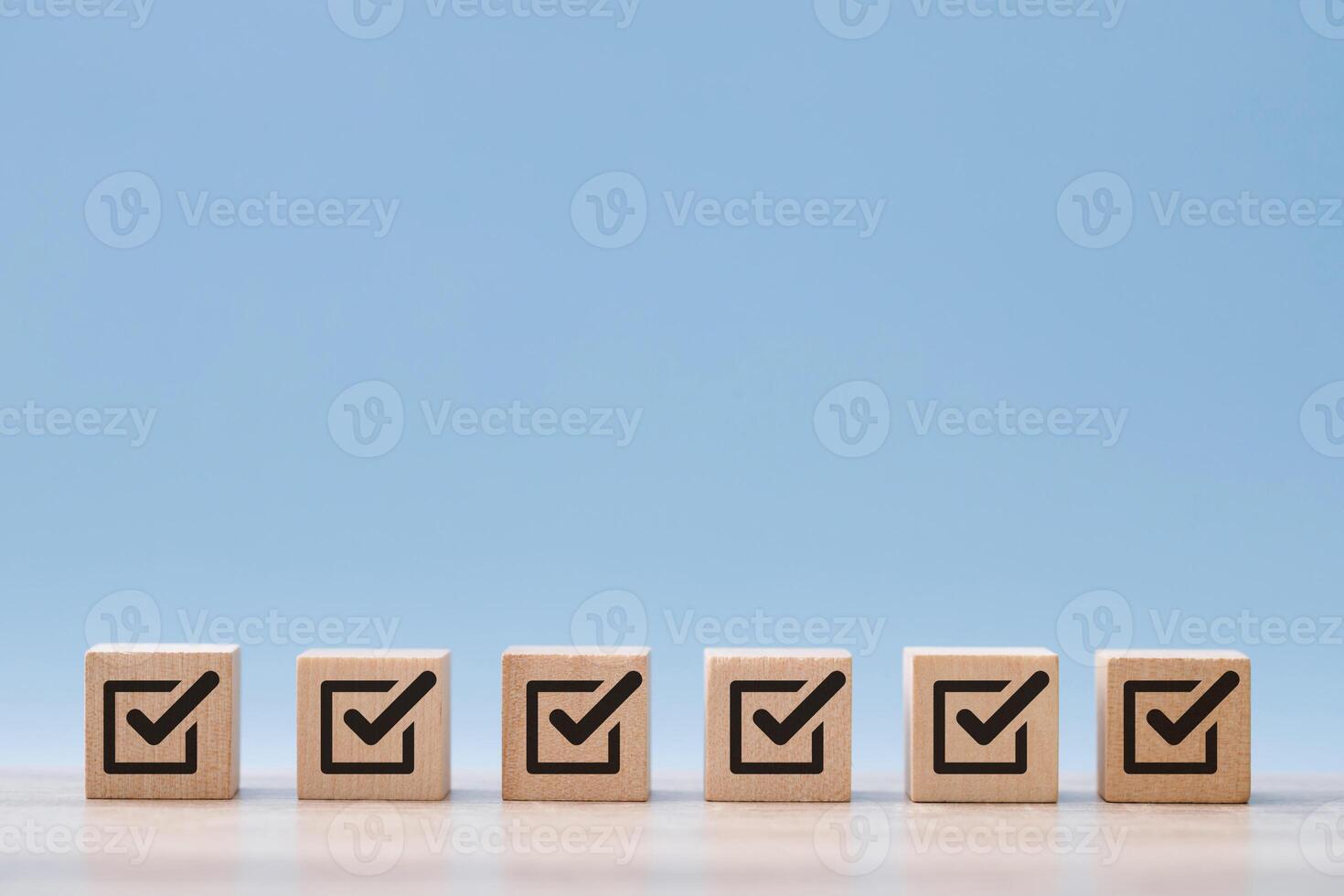 wood cube block with customer satisfaction rating to measure product evaluation photo